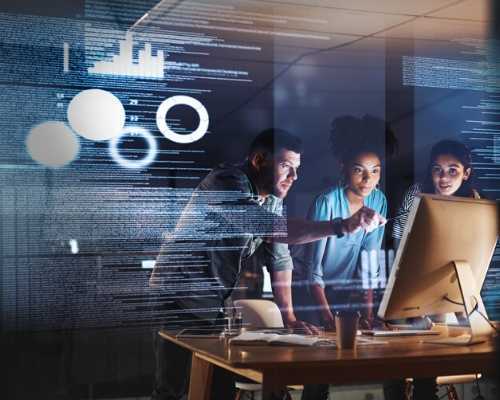 Workers Looking at Computer to Viewpoint Data and Diagrams